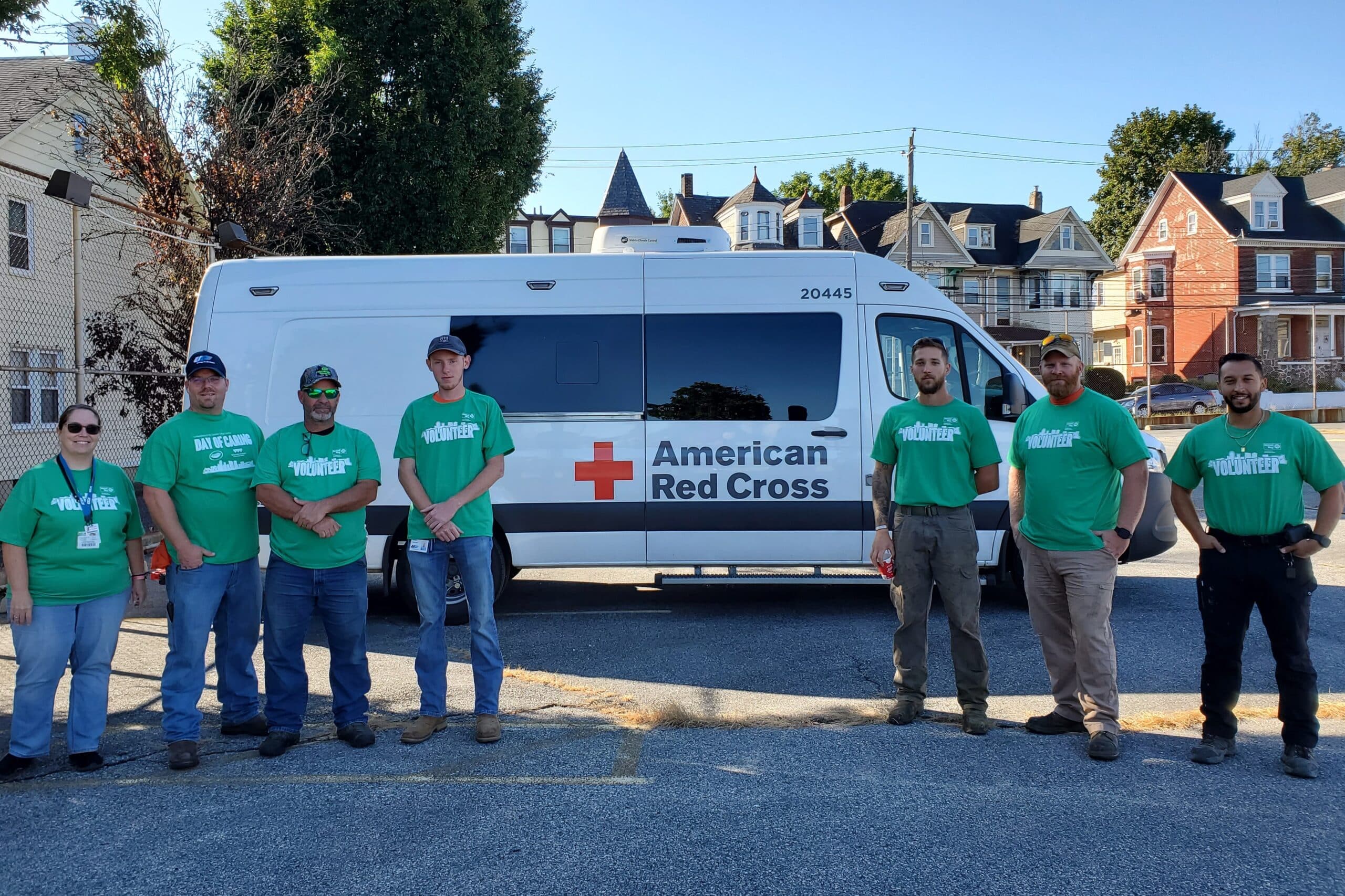 UGI volunteers posing for picture outside an American Red Cross van