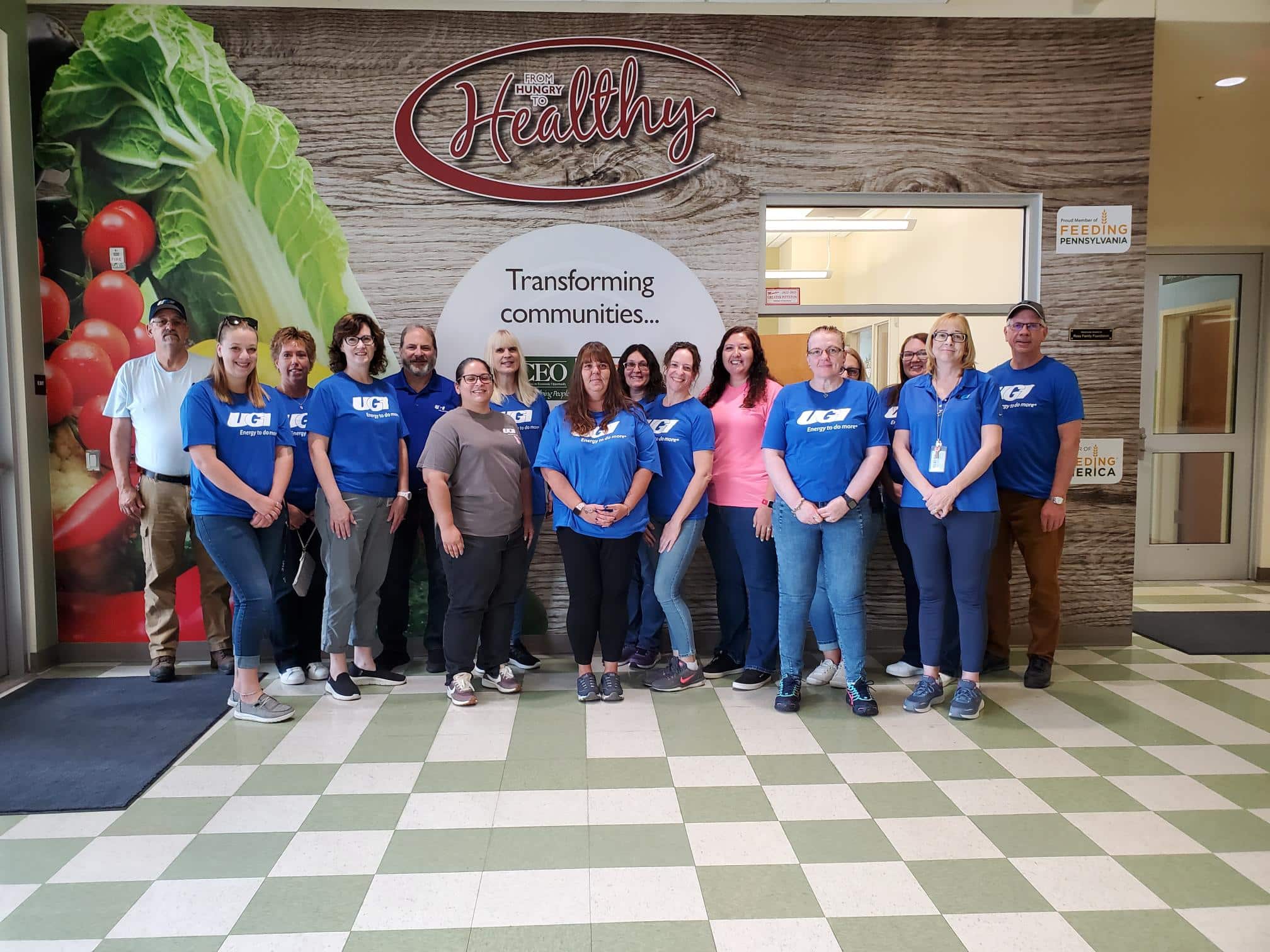 UGI employees stand together at Weinberg Food Bank.